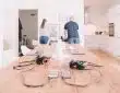 orange and black headphones on table